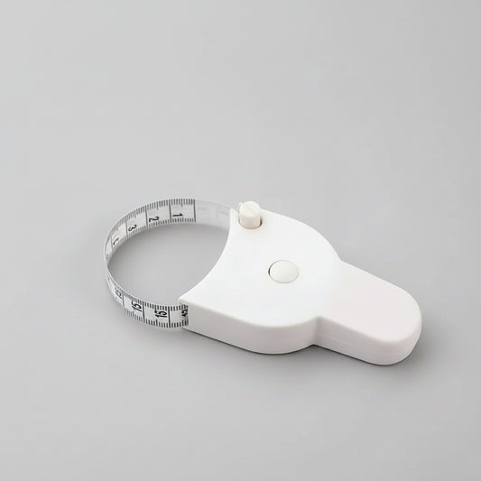 Retractable body measuring tape with clear markings in inches and cm.
