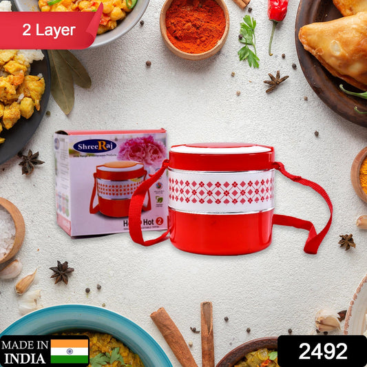 Blue 2-layer insulated tiffin set, shown open with its multiple compartments.